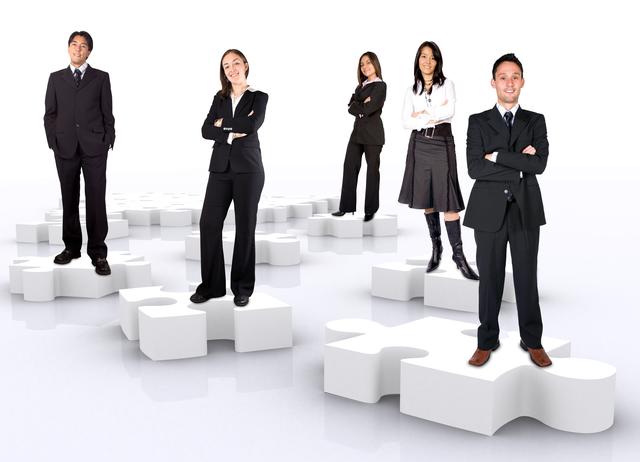 Business+Teamwork+On+Puzzle+Pieces Resurse umane